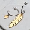 silver and gold feather earrings