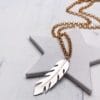 sterling silver and gold feather necklace